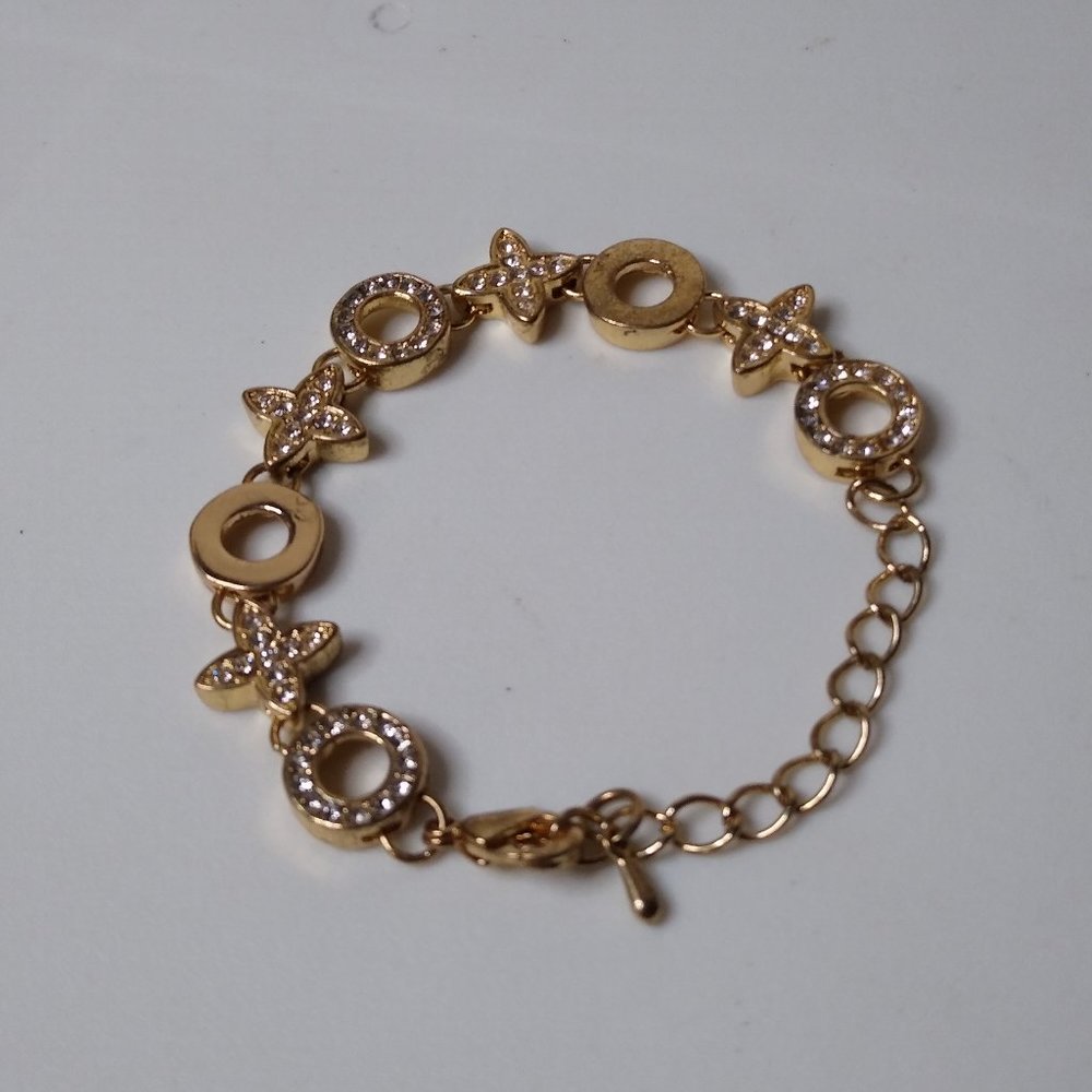 Metal X And O Bracelet Adjustable 5 To 6.5 Inches